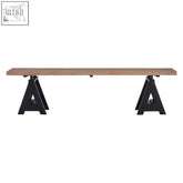 A sleek modern pine wood bench with natural finish and sturdy black metal a-frame legs perfect for indoor use