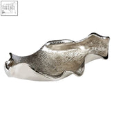 Silver textured metal dish shaped like a leaf with a sleek nickel finish large leaf design