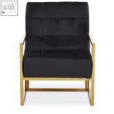 Black tufted velvet chair with gold metal frame perfect as a stylish black velvet armchair for modern decor