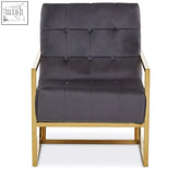 Dark gray grey velvet chair with tufted velvet and sleek gold metal frame for stylish living spaces