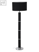 Hanah black snake leather floor lamp with sleek cylindrical design and chrome base for modern lighting