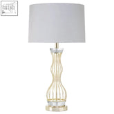 Hannah table lamp with a sleek gold finish, ribbed glass base, and textured grey shade for stylish lighting
