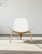Hans wegner armchair ch07 shell chair in white ash upholstery with curved oak frame and tapered legs