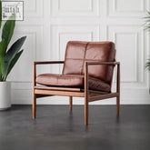 Brown leather hans wegner ch2 armchair with wooden frame combining style and comfort in ch2 stylish armchair design