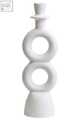 White ceramic candle holder with stacked circular rings and tapered top perfect for large cream candle holder