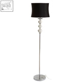 Slender chrome finish floor lamp with black shade and clear crystal beads along the stem for elegant lighting