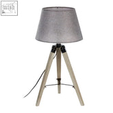 Harper grey tripod table lamp with a textured grey fabric shade and light wooden tripod legs for stylish lighting