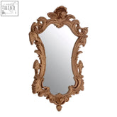 Antique gold finish wall mirror has intricate baroque carvings and a decorative crest perfect for elegant decor
