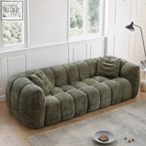 Olive green havan sofa with plush textured fabric and rounded tufted cushions for exceptional comfort