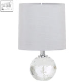 Helma crystal base table lamp with a clear crystal base and grey fabric shade for a modern look