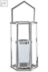 Large silver hexagonal lantern made of silver-toned metal with clear glass panels perfect for cozy lighting