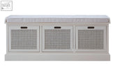 Heritage antique white three drawer storage bench with cushion featuring an antique white finish and cane-front drawers