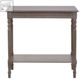 Gray distressed wood heritage console table with turned legs and lower shelf in pine wood grey washed finish