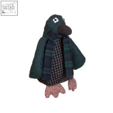 A cozy handcrafted heritage green small penguin door stop made from dark green plaid fabric with checkered belly and pink feet