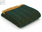 Folded dark green and mustard emerald mustard herringbone pure new wool throw 183cm including fringe for double bed