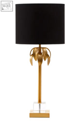 Herta gold finish palm tree design table lamp with gold finish palm trunk, clear crystal base, and black drum shade