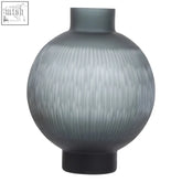 A sleek hessa large carved grey glass vase with vertical ribbed texture and black base perfect for stylish decor