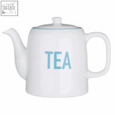 White ceramic homestead teapot with light blue tea lettering and blue teapot rim and comfortable handle