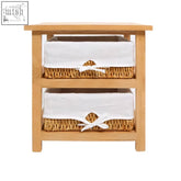 Light wood nightstand with maize baskets storage unit featuring white cotton liners and decorative bows