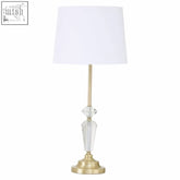 Hope table lamp with white drum shade clear crystal gems and polished brass base adds elegance to any room