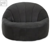 Hoxton antique black leather lounge cocoon chair in plush velvet with dense foam padding and subtle vertical stitching