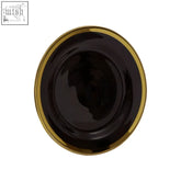Ida black glass dinner plate featuring a black ceramic surface with a stylish gold rim for elegant dining