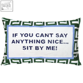 Green velvet needlepoint cushion with geometric pattern and navy embroidered if you cant say anything nice text