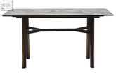 Dark gray rectangular dining table with ceramic marble effect top and black metal x-shaped support legs