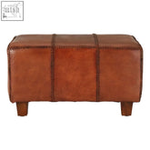 Brown leather bench with stitched paneling and teak wood legs perfect for stylish seating or footrest