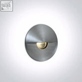 Circular brushed stainless steel wall recessed sconce with gold textured lens for indoor and outdoor installation
