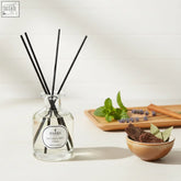 Clear glass inspiring diffuser 100ml with black reeds and white label by parks nature made in england using premium essential oils