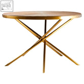 Jana round fir wood dining table with gold-finished metal x-shaped legs and round wooden top for stylish dining
