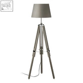 Silver jasper floor lamp with gray fabric shade features a central folding mechanism and reflective chrome tripod base