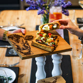 Wooden jersey cow oak serving and cheese board with detailed engraved cow illustration for cow oak serving