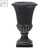 Black josten planter with grey finish and white highlights featuring a fluted rim and classic design