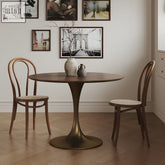 Bronze finished justina small round dining table with smooth top and elegant curved legs solid wood design
