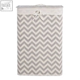 Gray and white chevron laundry hamper with fabric top and bow tie closure perfect for stylish laundry storage