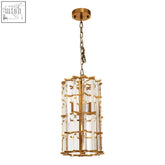 Karli brass finish small vertical light with gold-toned cylindrical pendant and clear glass panels on chain suspension