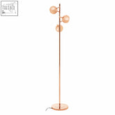 Karter copper finish three-light floor standing lamp with spherical bulbs and sleek copper finish floor design