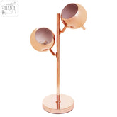 Karter copper finish table lamp with two spherical globe shades in stylish copper finish for modern decor