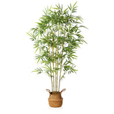 Tall artificial bamboo tree with slender green stalks and lush leaves in a woven wicker basket for indoor use