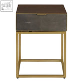 A sleek kempton end table with a dark brown top gray textured drawer and gold metal legs perfect as a nightstand