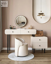 Cream-colored quilted leather vanity chair with a modern curved design for kendall dressing table use