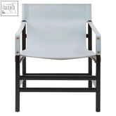 Light blue canvas chair with black metal frame and silver rivets in kendari grey leather and teak wood style