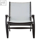 Black-framed kendari grey leather and teak wood chair with light gray fabric seat and silver-toned stud accents