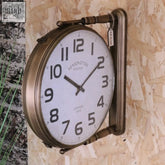 Brass-framed kensington station double sided clock with white face black numerals sided clock for wall display