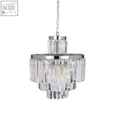 A tiered kensington townhouse bulbs pendant light with polished chrome finish and cascading glass prisms