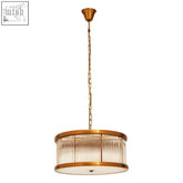 Kensington townhouse bulb pendant light with brass finish and cylindrical glass shade featuring vertical ridges and gold trim