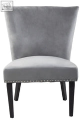 Kensington townhouse grey winged dining chair in gray velvet with black legs and silver nailhead trim