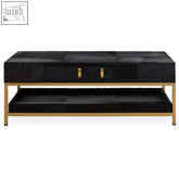 Black kensington townhouse hair on leather coffee table with gold metal frame and drawer pulls for stylish living room